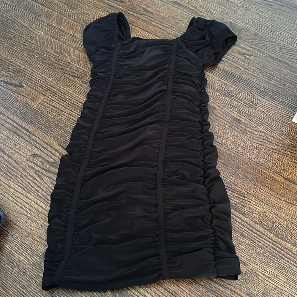 Cheryl creations. NWT. Black capped sleeve ruched dress.